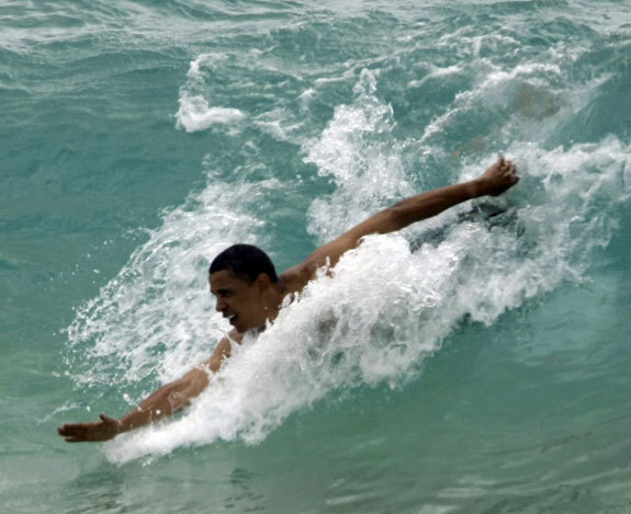 Obama body surfing.